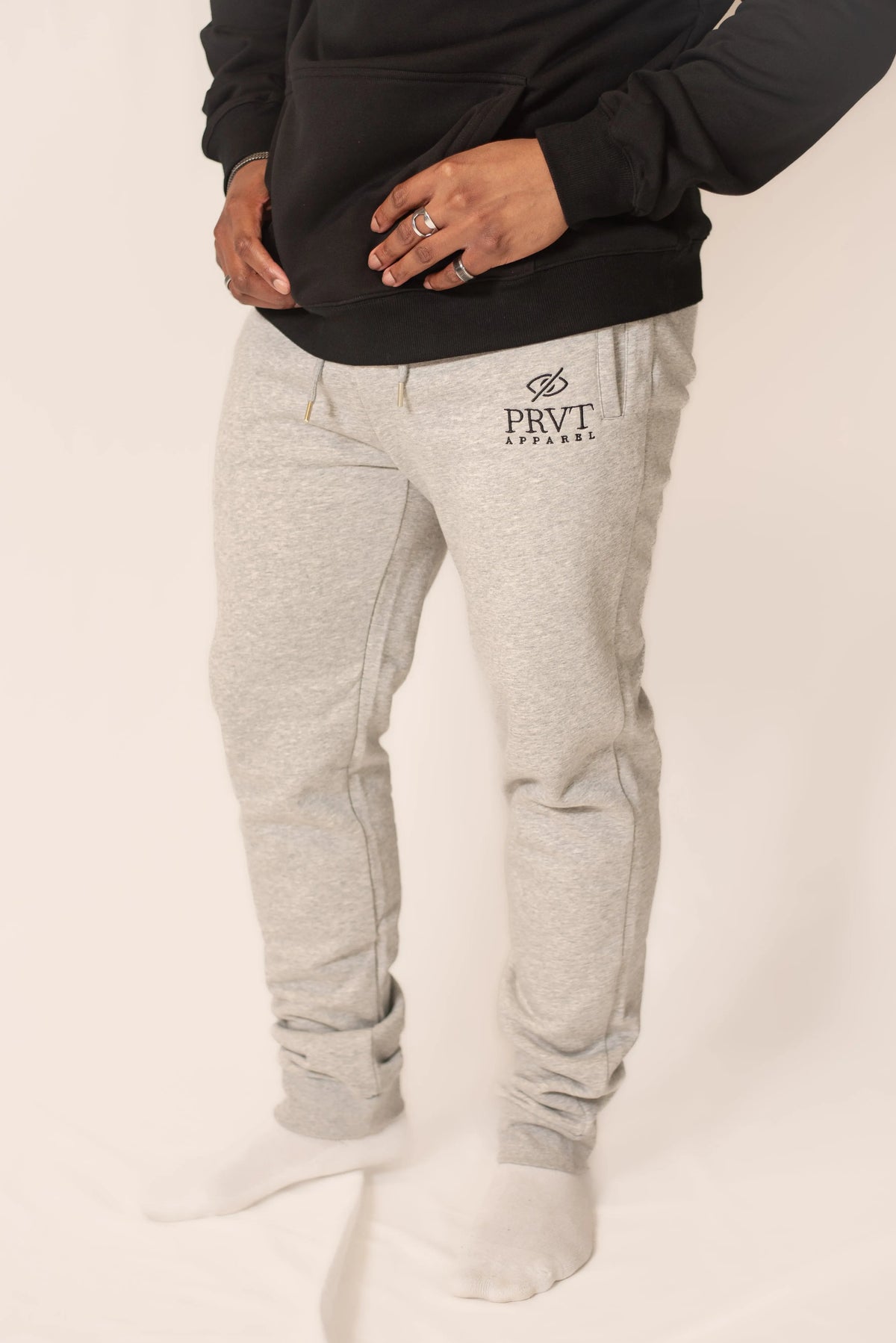 Men's signature sweats from PRVT Apparel Inc., featuring a comfortable fit and stylish design in a casual setting.