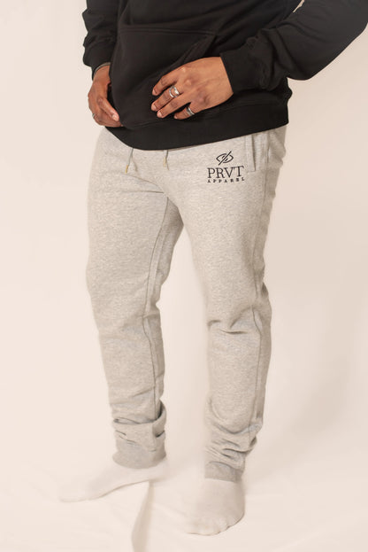 Men's signature sweats from PRVT Apparel Inc., featuring a comfortable fit and stylish design in a casual setting.