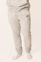 Soft gray classic sweats from PRVT Apparel Inc., featuring a relaxed fit and subtle branding, perfect for casual wear.