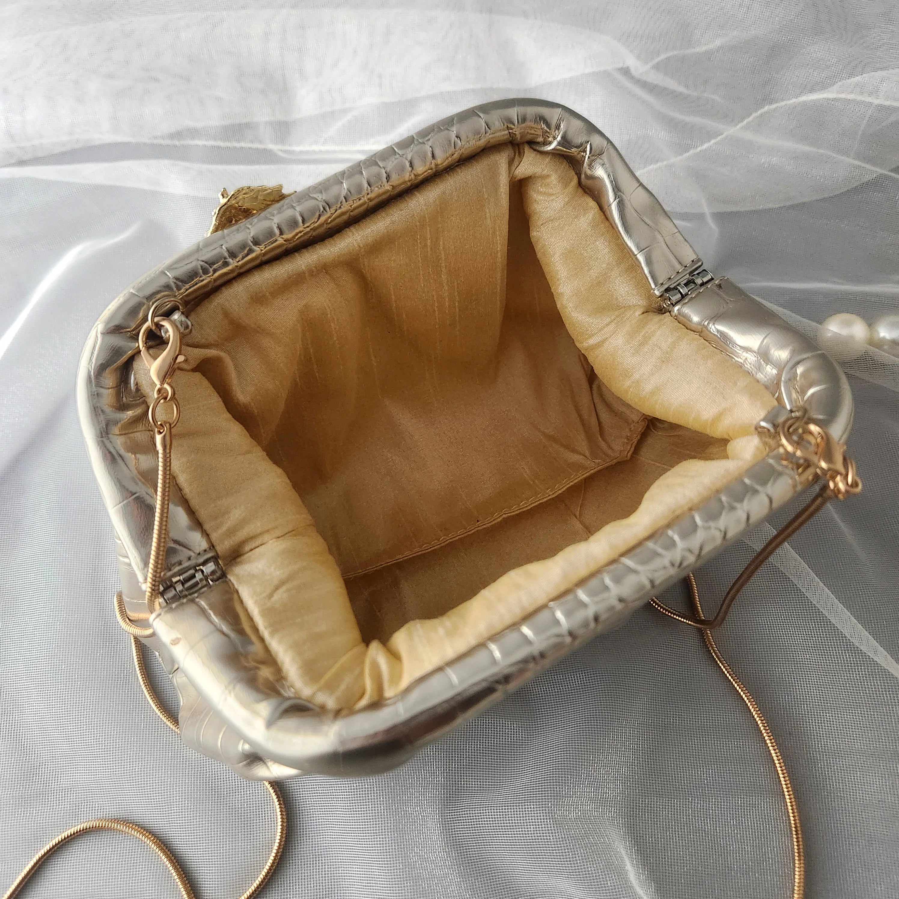 Elevate Your Style with the Luxury Evening Clutch: Golden Gallop Cloud Clutch