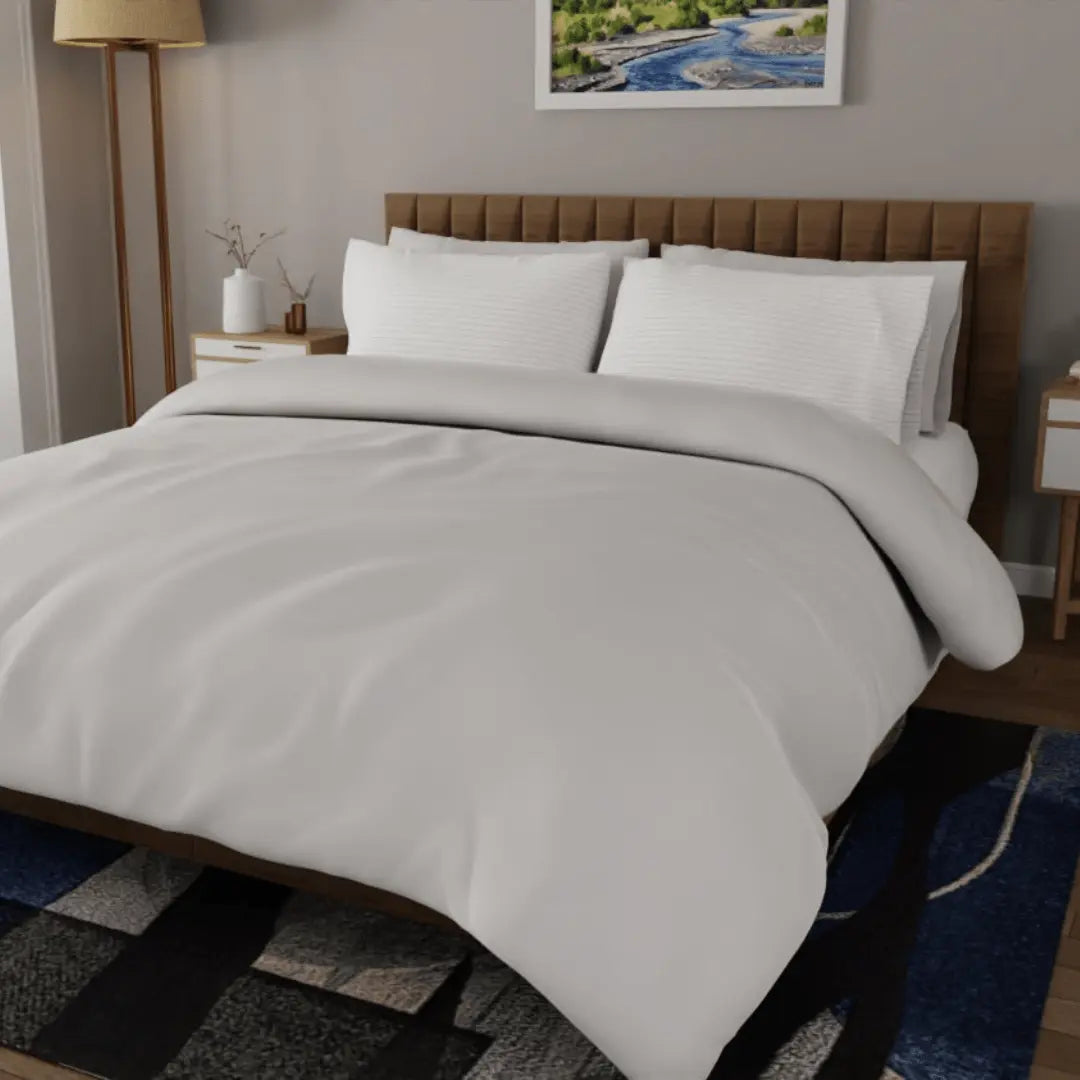 Luxurious organic percale sheets set by Skylark+Owl Canada, featuring crisp, breathable fabric in a cozy bedroom setting.