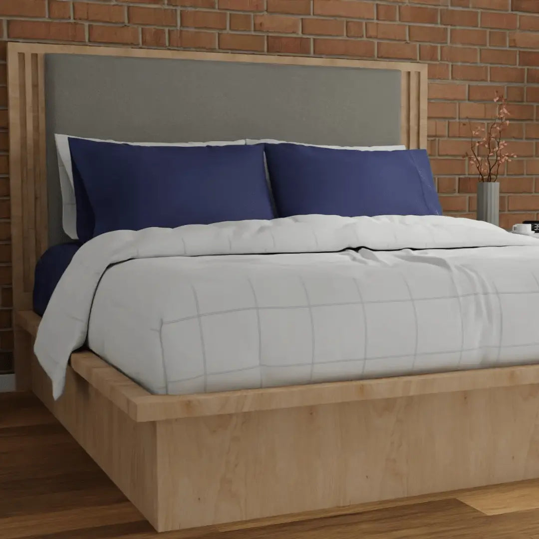 Organic percale duvet cover by Skylark+Owl Canada, showcasing a soft, stylish bedding set in a cozy bedroom setting.
