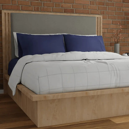Organic percale duvet cover by Skylark+Owl Canada, showcasing a soft, stylish bedding set in a cozy bedroom setting.