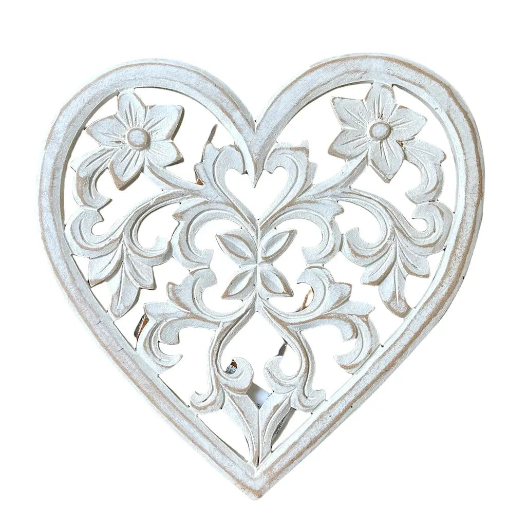 Wooden carved heart decoration by Suzie Blue Canada, ideal for home décor, featuring intricate craftsmanship and natural wood finish.