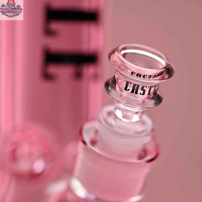 Pink 14-inch beaker bong by Castle Glassworks with electroplated glass and a close-up view showing the bowl on a pink background.