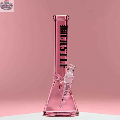 Pink 14-inch beaker bong by Castle Glassworks with heavy-duty electroplated glass on a pink background.