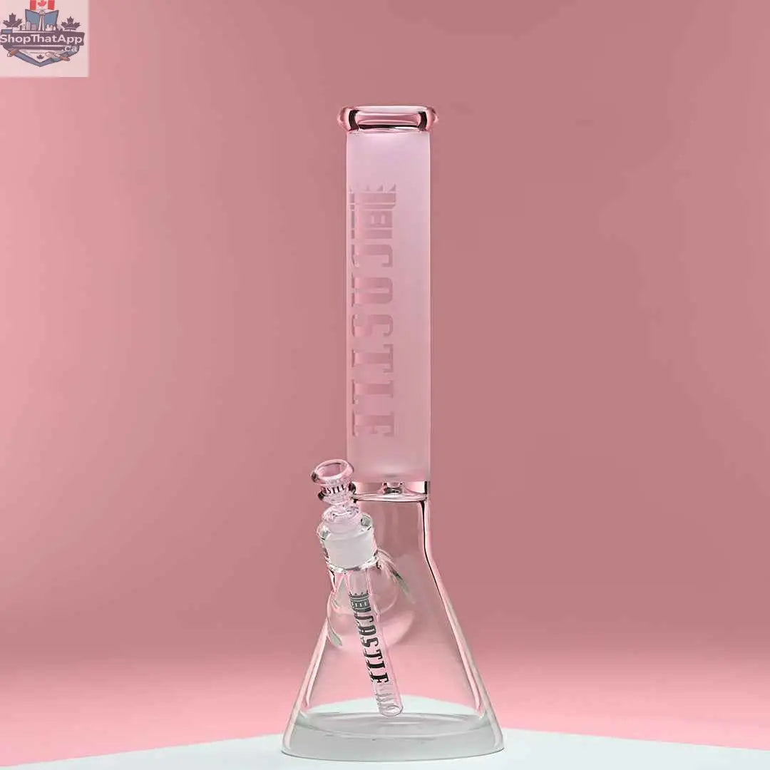 Pink frosted beaker bong by Castle Glassworks, 16-inch tube design for smooth smoking, displayed against a pink background.