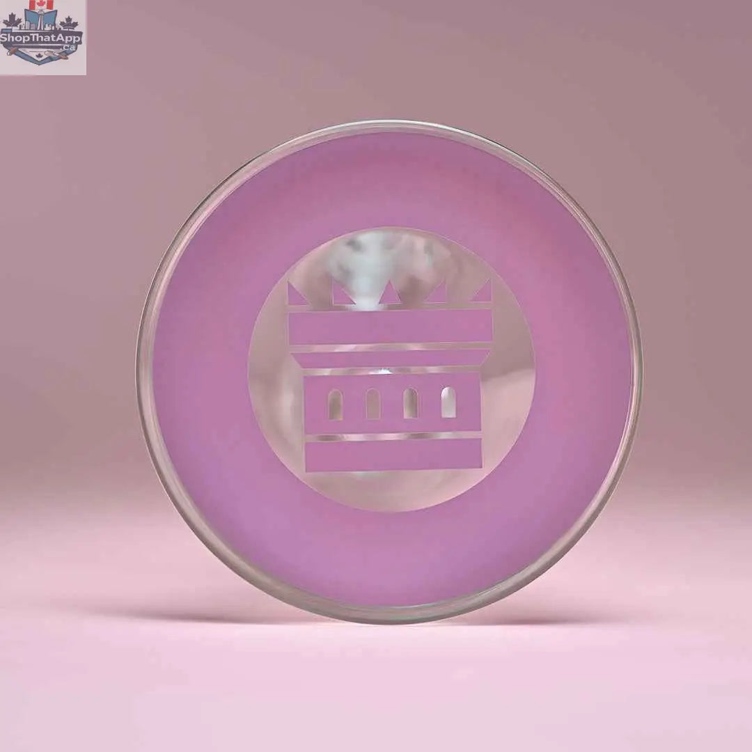 Castle Glassworks 14-inch beaker bong with pink logo and 9-hole downstem, shown close-up on pink background.