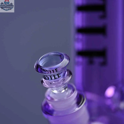 Purple 14-inch Castle Glassworks beaker bong with heavy-duty electroplated glass, close-up shot showing bowl and vibrant background.