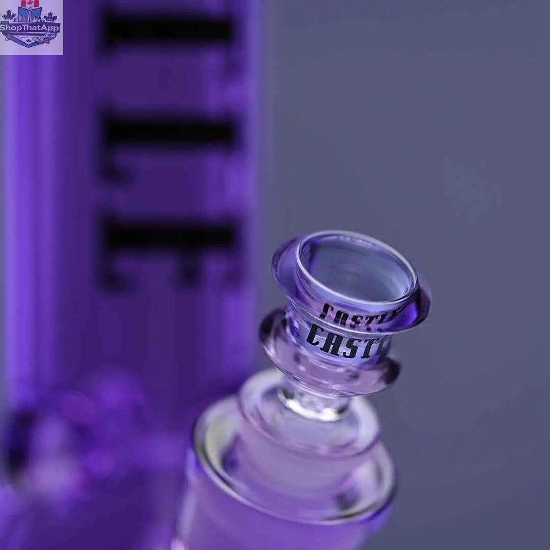 Close-up of a 14-inch Castle Glassworks beaker bong with purple electroplated glass and a matching purple background.
