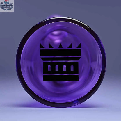 Close-up of Castle Glassworks 14-inch purple beaker bong with heavy-duty electroplated glass and detailed base showing purple background.