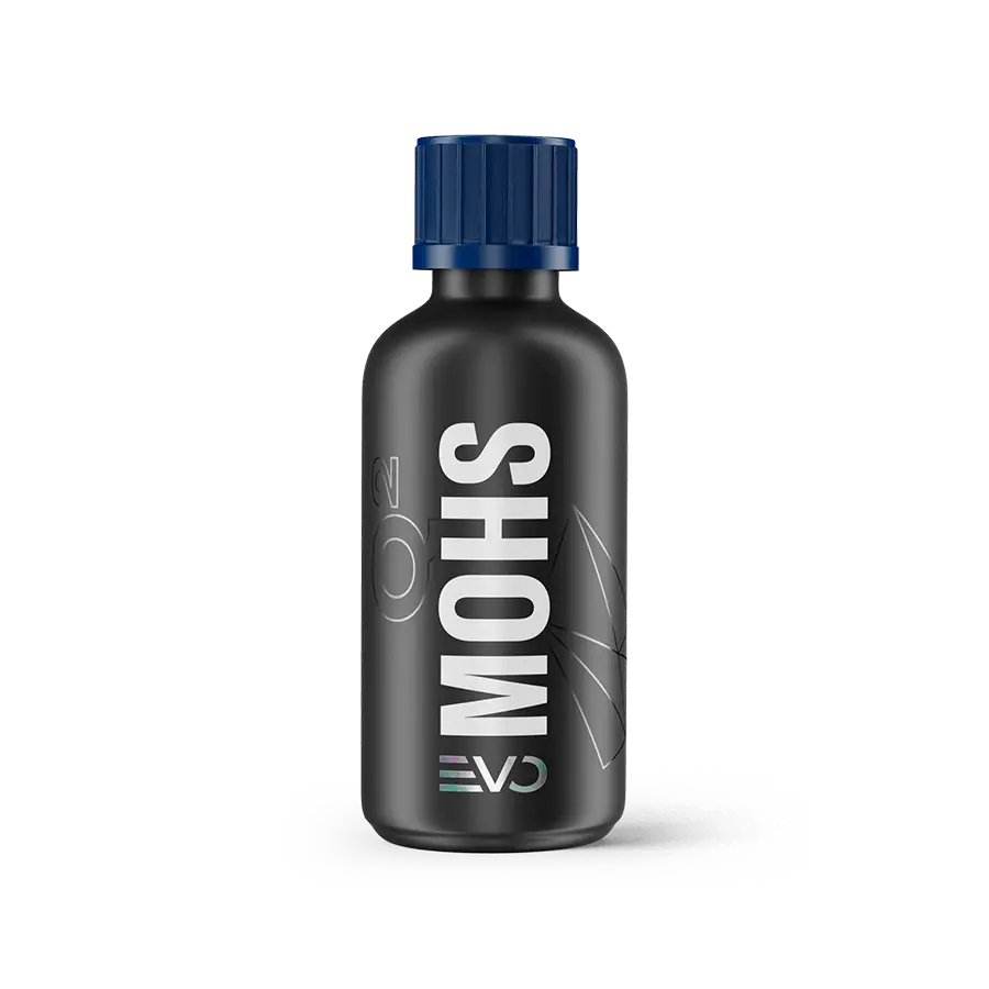 GYEON Q² Mohs EVO ceramic coating kit bottle by CARZILLA, featuring a sleek black bottle with product label and applicator cap
