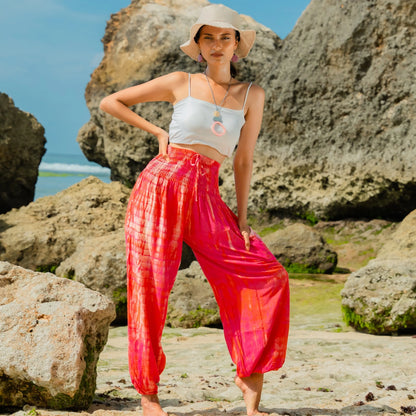 Pink tie dye Bali pants by Suzie Blue Canada featuring a stylish, vibrant design and comfortable fit.