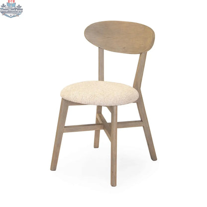 Rose dining chair by Hygge Design House in scrubbed teak with a curved backrest and cushioned seat for comfortable dining.