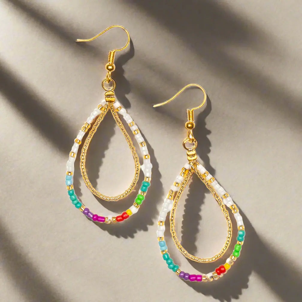 Colorful bead earrings by Suzie Blue Canada featuring vibrant multi-color beads and a stylish earring design.