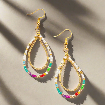 Colorful bead earrings by Suzie Blue Canada featuring vibrant multi-color beads and a stylish earring design.