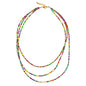 Elegant triple strand pearl necklace by Suzie Blue Canada featuring lustrous pearls and a sophisticated design.