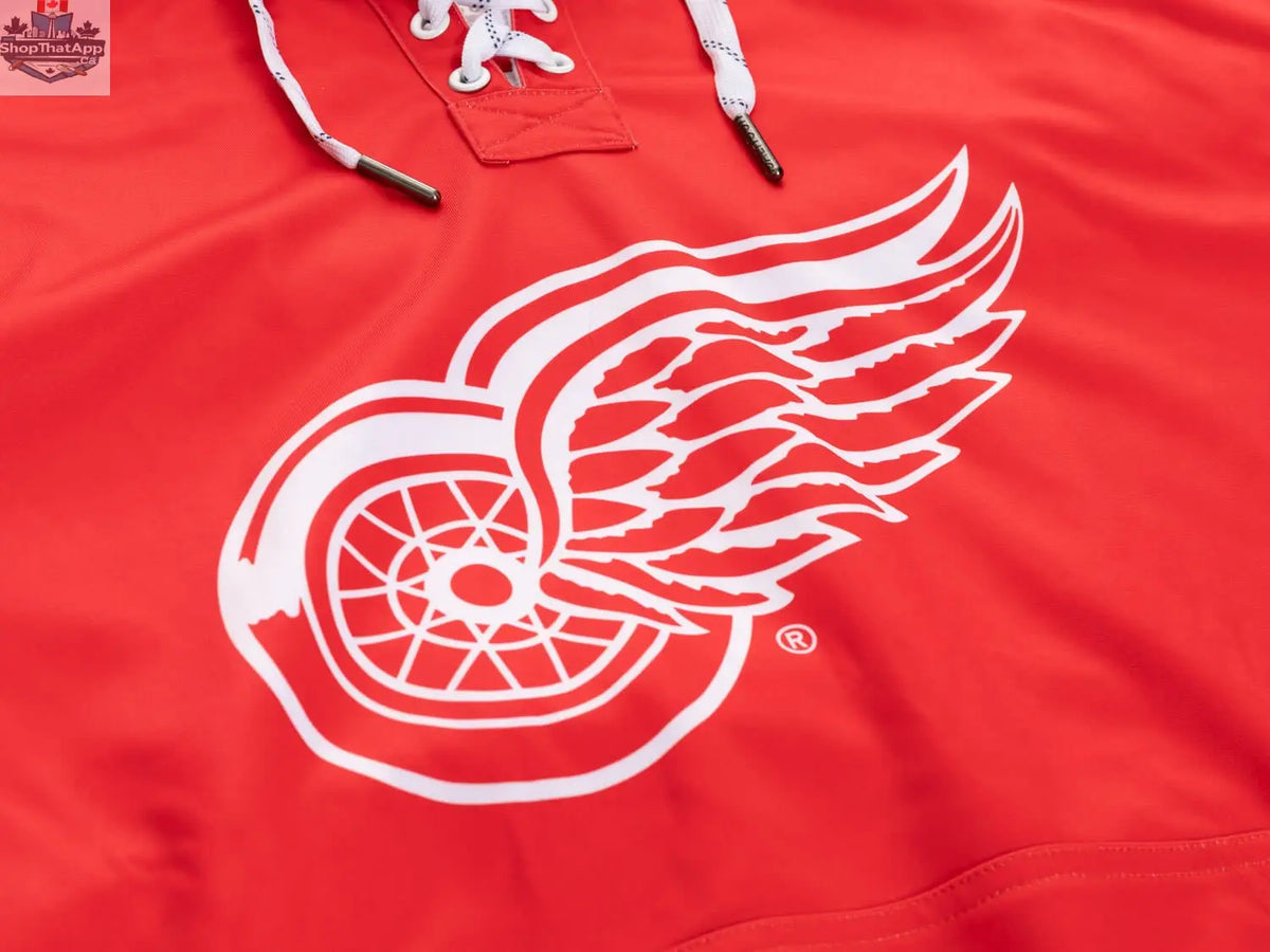 Detroit Red Wings hoodie by Calhoun Surf N' Skate featuring a lace-up design and team logo on a vibrant red fabric.