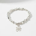 Flower Charm Nugget Bracelet in Silver Plate - Shopthatapp.ca