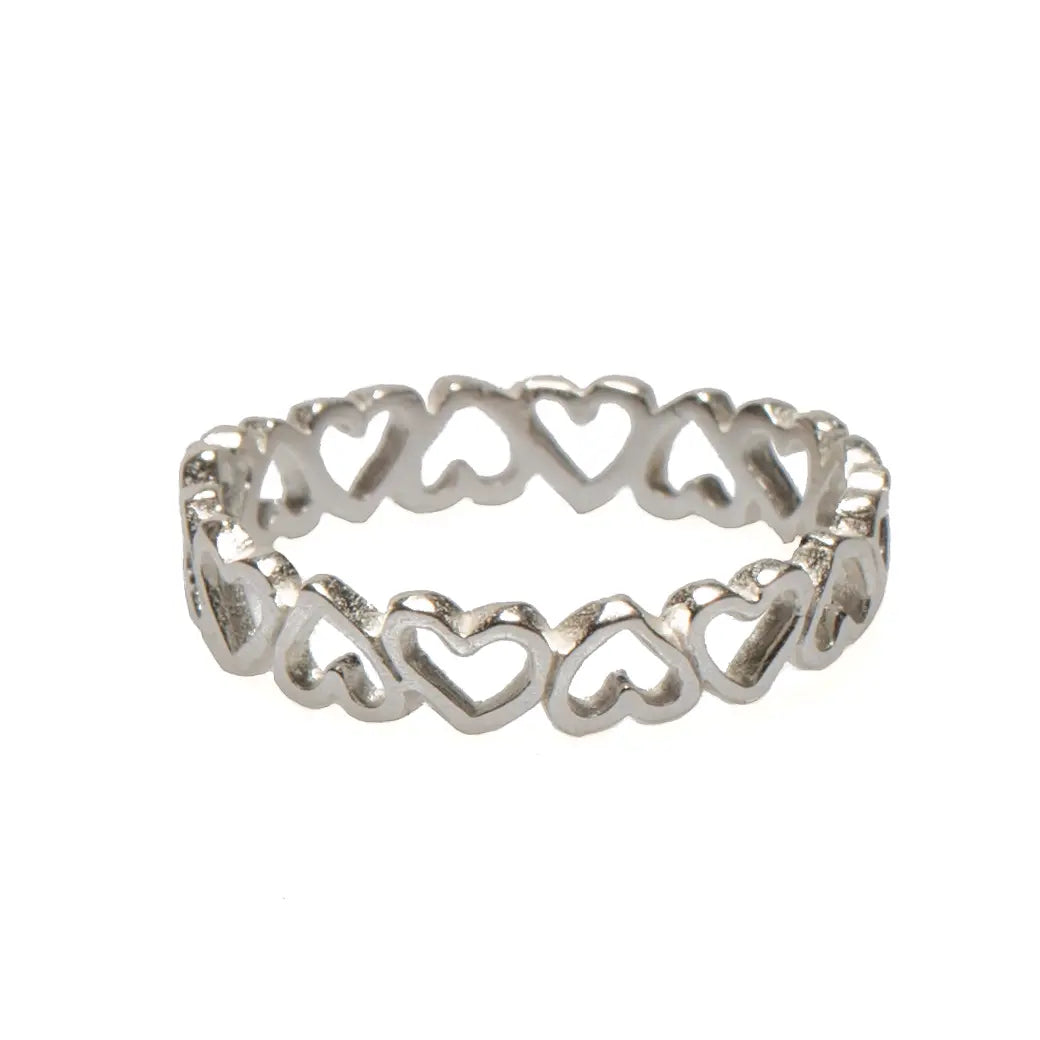 Suzie Blue Canada multi heart ring featuring layered silver-tone hearts on a sleek band, elegant jewelry for women.