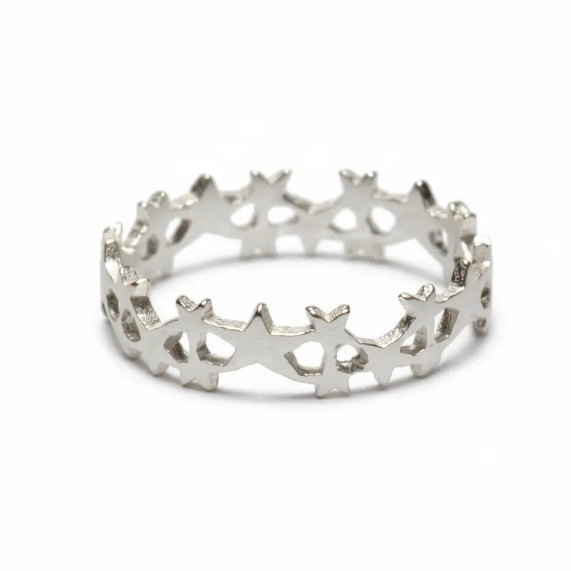 Silver multi-star ring by Suzie Blue Canada featuring multiple star-shaped accents on a sleek band.