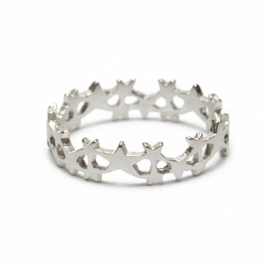 Silver multi-star ring by Suzie Blue Canada featuring multiple star-shaped accents on a sleek band.