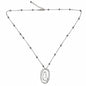 Silver swirl pendant necklace on chain by Suzie Blue Canada, featuring a shiny silver plate design.