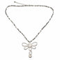 Silver dragonfly necklace on a cube chain, featuring a delicate dragonfly pendant, by Suzie Blue Canada.