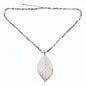 Silver leaf necklace on cube chain by Suzie Blue Canada, showcasing a delicate silver pendant with a sleek chain.