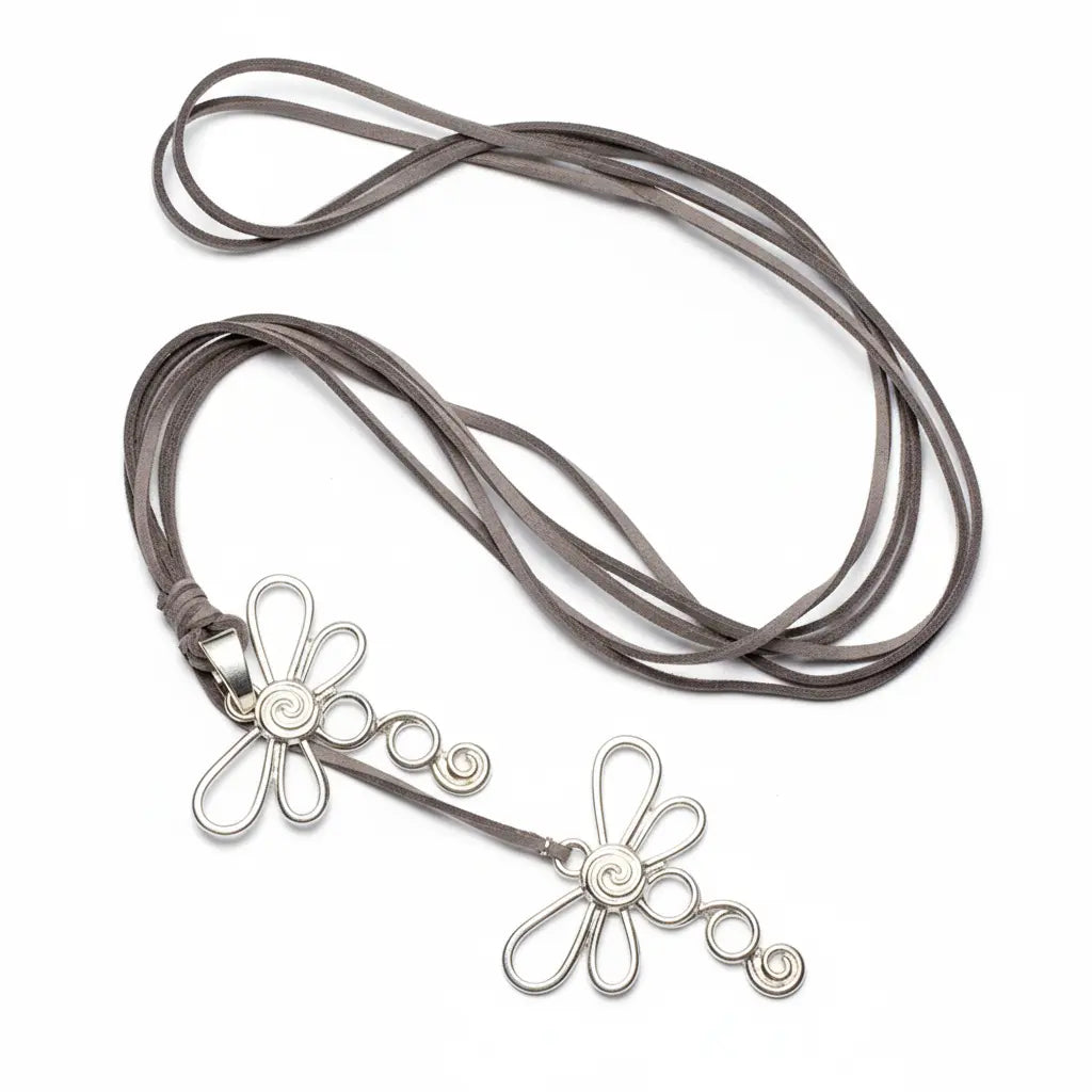 Silver-plated double dragonfly necklace on suede cord by Suzie Blue Canada, featuring intricate dragonfly charms and soft suede strap.