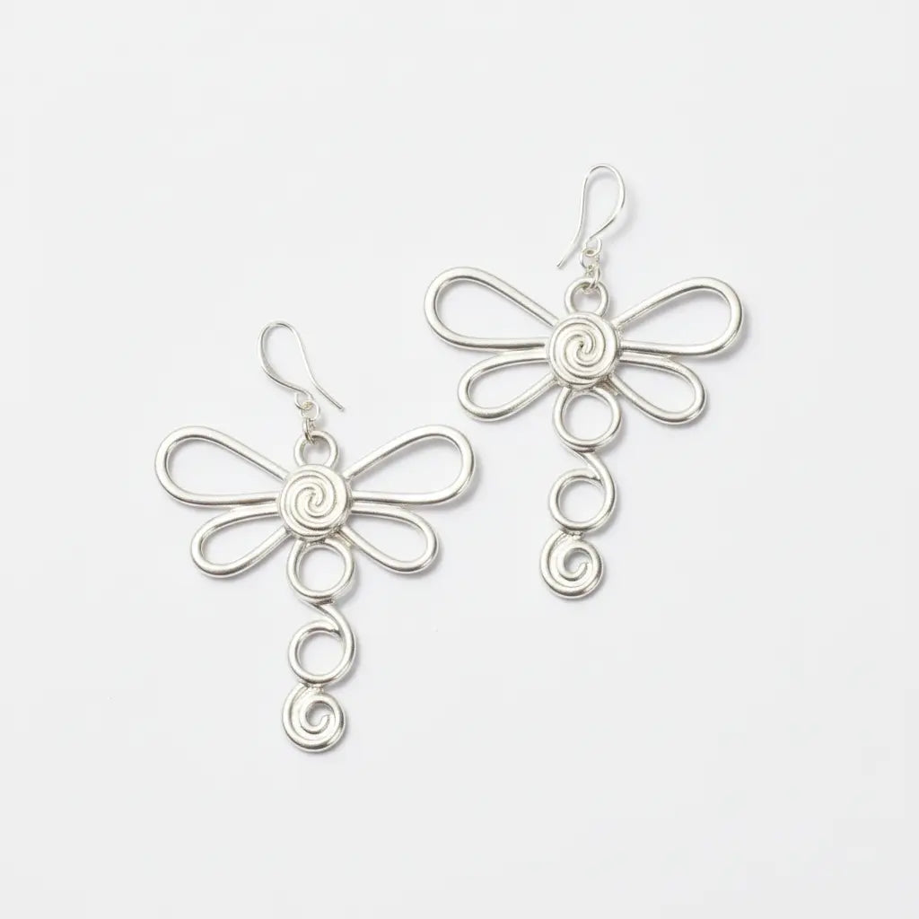 Large silver plate dragonfly earrings with intricate wing details, stylish and lightweight jewelry by Suzie Blue Canada.