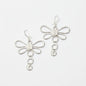 Large silver plate dragonfly earrings with intricate wing details, stylish and lightweight jewelry by Suzie Blue Canada.