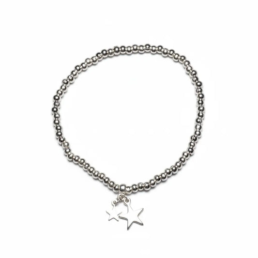 Silver star charm bracelet from Suzie Blue Canada featuring elegant silver jewelry with a charming star design.
