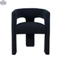 Sven upholstered dining chair in black bouclé fabric with wooden legs, designed by Hygge Design House, front view.