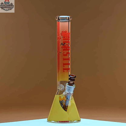 Castle Glassworks 16-inch Samurai beaker bong with 9mm thick glass, shown against an amber background, designed for smooth hits.