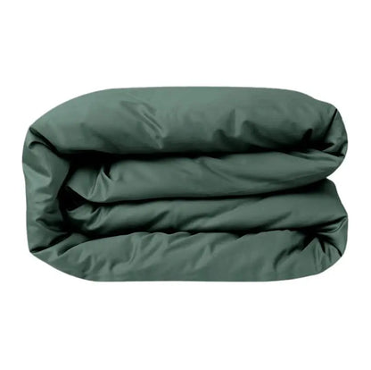 Luxurious forest green sateen duvet cover by Skylark+Owl Canada, featuring smooth, refined fabric for elegant bedroom decor.