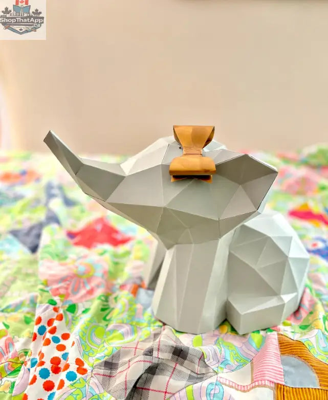 Sofs Lifestyle DIY baby elephant origami kit with colorful paper sheets and instructions for 3D paper craft modeling.