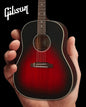 Vermillion Burst Slash Gibson J-45 Mini Acoustic Guitar by Little Guitars, showing the small, detailed body and neck of the mini guitar.