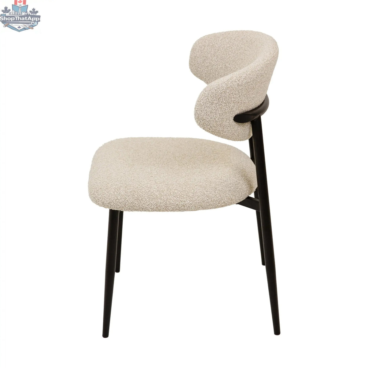Hygge Design House Remi dining chair with wooden legs and upholstered beige fabric seat, modern and comfortable for dining room.