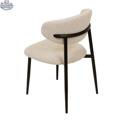 Remi dining chair by Hygge Design House featuring a modern wooden frame and upholstered seat for contemporary dining rooms.