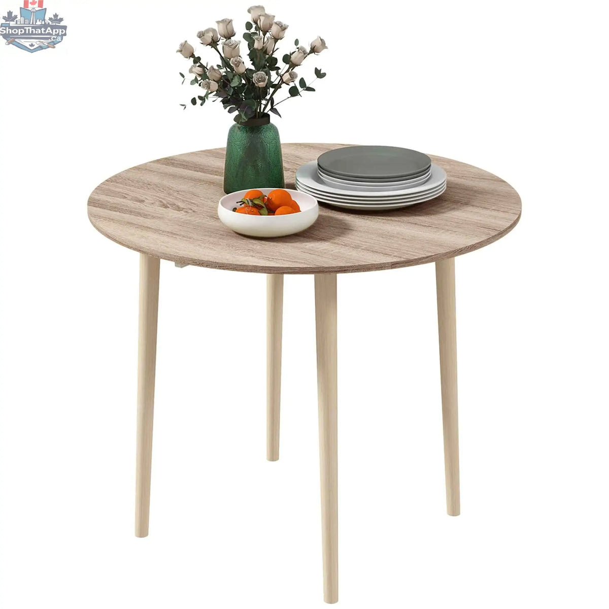 Round folding dining table by SLOTH Nation with oak finish, drop-leaf design ideal for small kitchen or dining spaces.