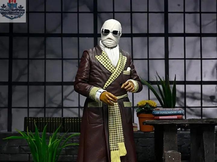 Toy Snowman Universal Monsters Invisible Man figure, Ultimate Kemp House color version, detailed collectible action toy.