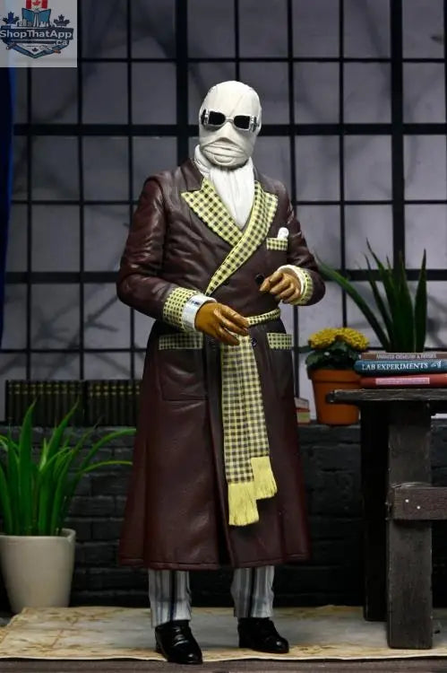 Toy Snowman Universal Monsters Invisible Man action figure, ultimate Kemp House color version, collectible toy with detailed design.