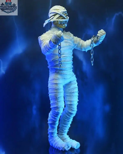 Iron Maiden Mummy Eddie action figure by Toy Snowman, clothed collectible toy with detailed mummy design and band logo, display-ready.