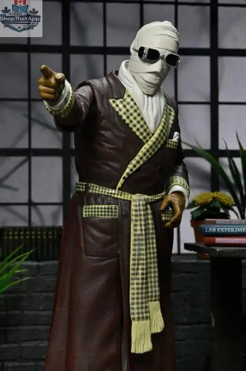 Toy Snowman Universal Monsters Invisible Man action figure in ultimate Kemp House color version, detailed collectible toy with iconic design.