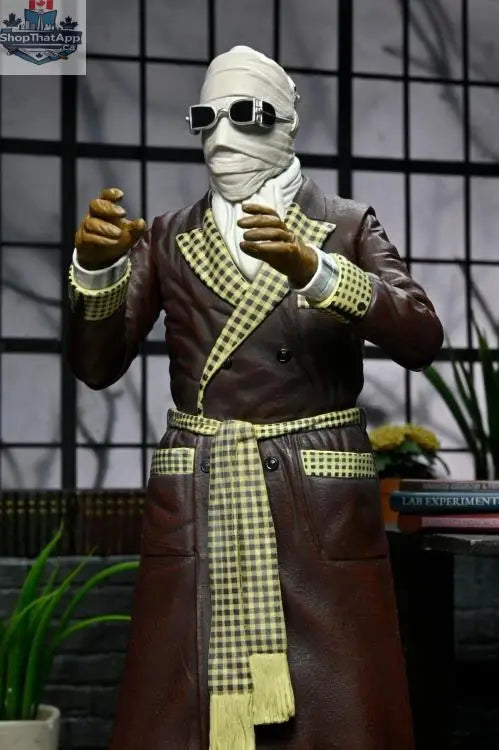 Invisible Man action figure from Toy Snowman, Ultimate Kemp House color version, detailed collectible toy in a dynamic pose.