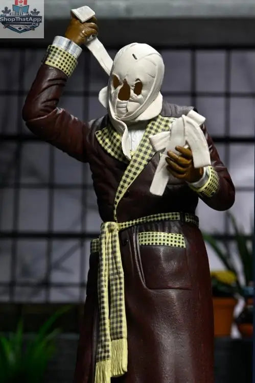 Toy Snowman Universal Monsters Invisible Man action figure in ultimate Kemp House color, detailed collectible toy, display-ready.