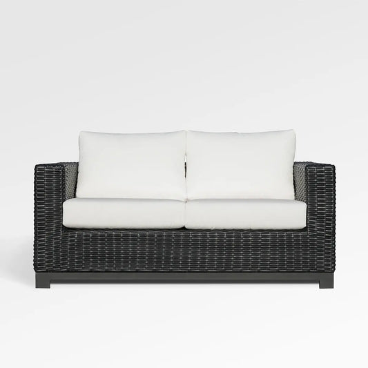 Enclover Trillium loveseat with Sunbrella cushions, stylish outdoor seating with plush comfort and elegant design.