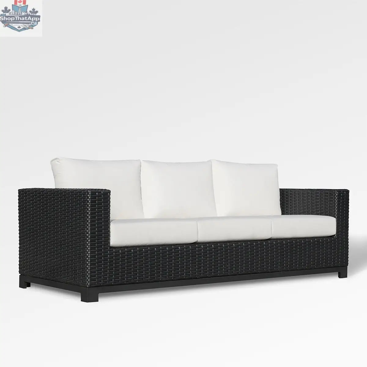 Enclover Trillium sofa with Sunbrella cushions showcasing a stylish, comfortable living room setup with plush seating.