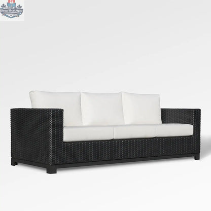 Enclover Trillium sofa with Sunbrella cushions showcasing a stylish, comfortable living room setup with plush seating.